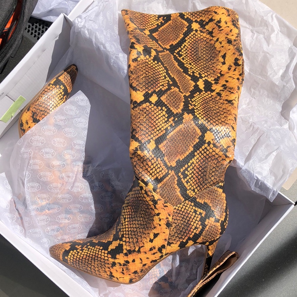 Brown and Black Heeled Boots with Snakeskin Pattern